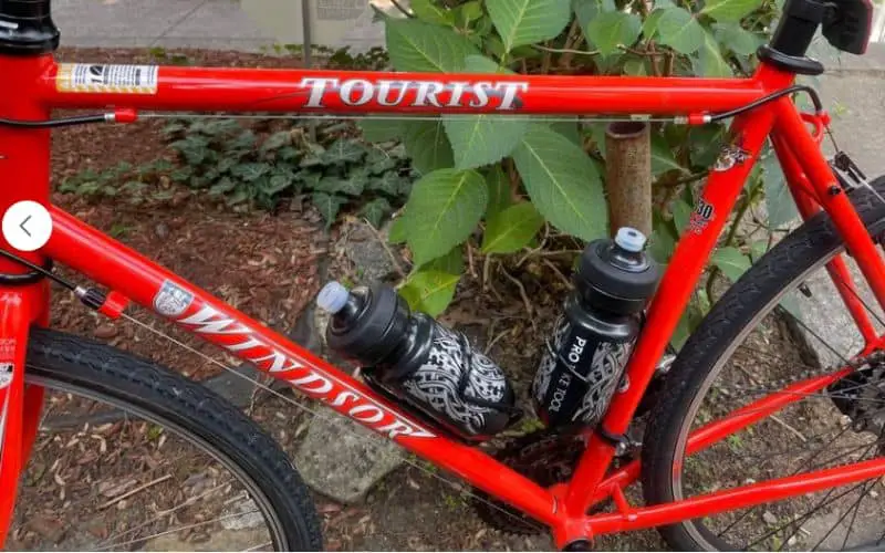 Touring bike holding 2 bottles of water