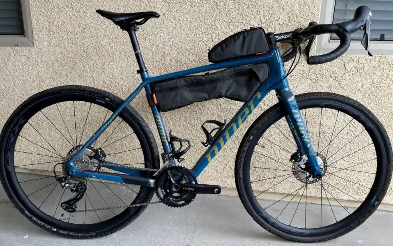 Niner Carbon Gravel Bike against wall
