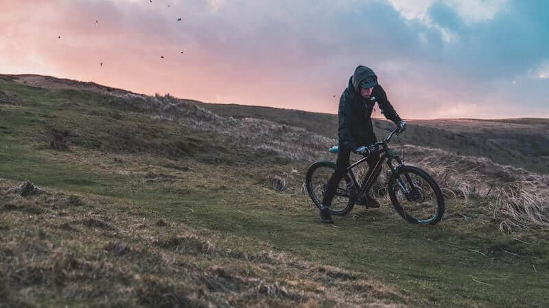 Man Riding MTB On Grass