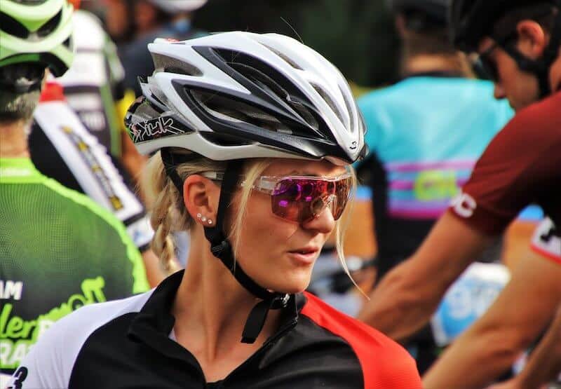 Blonde Cyclist Wearing A Helmet