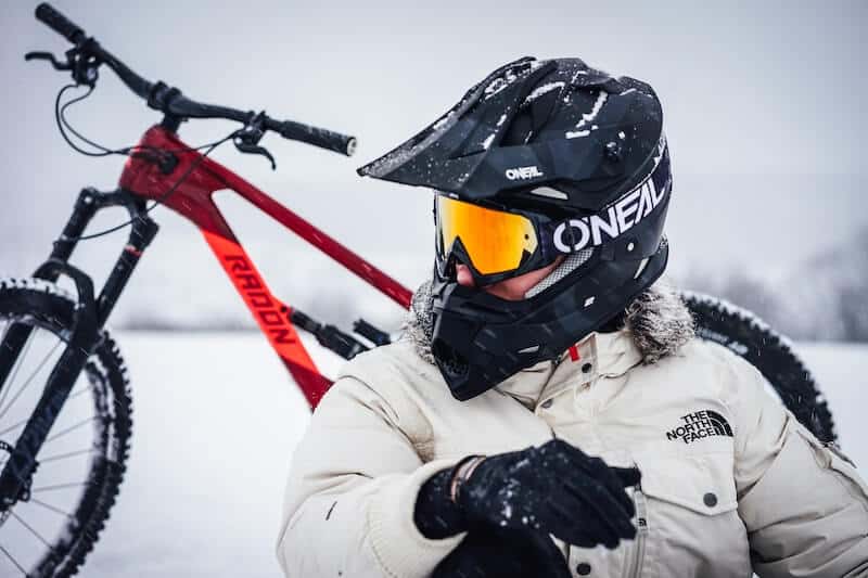 Rider Wearing Full Face Helmet In Snow
