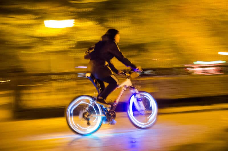 Cyclist With Bike Wheel Lights