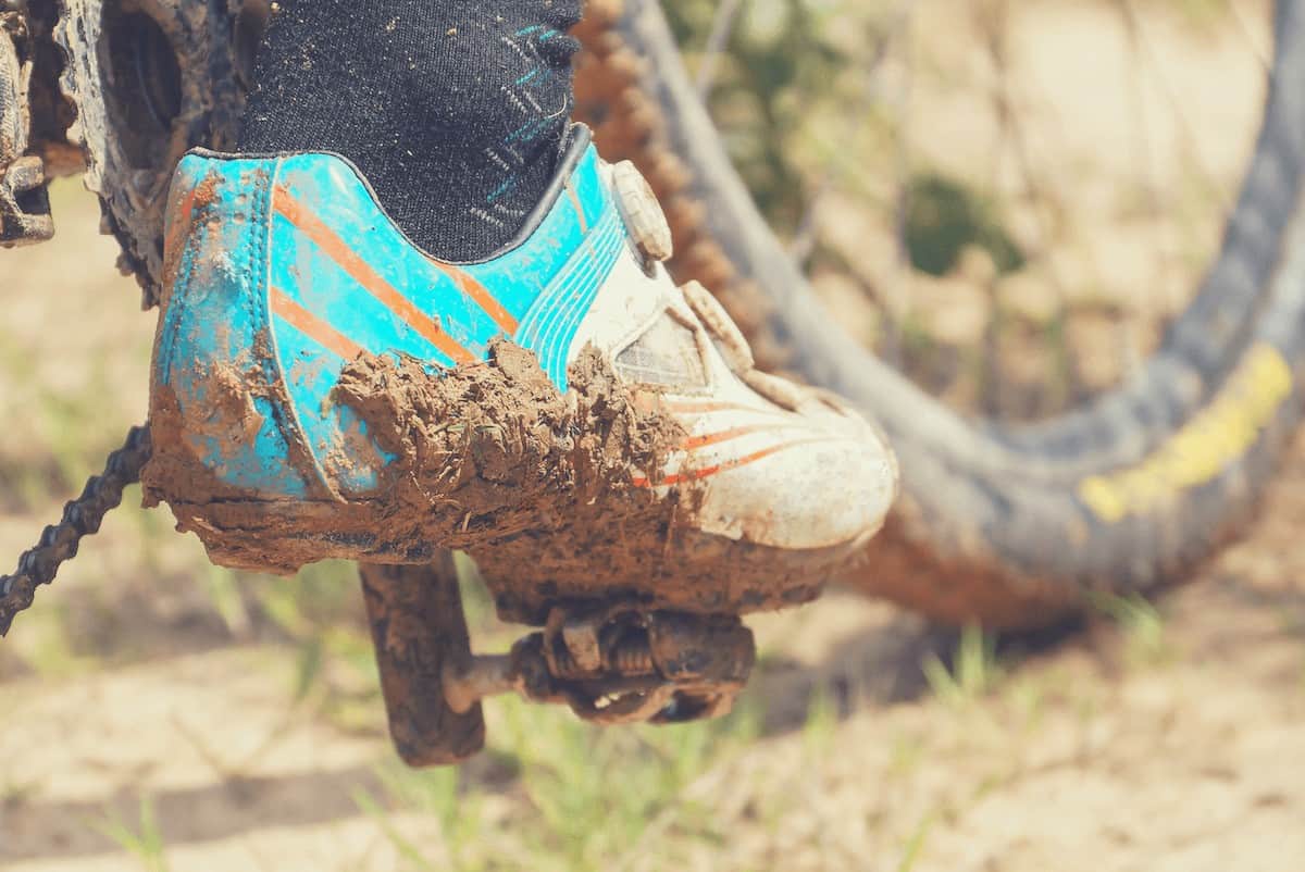 Cycle Touring Shoes Covered In Mud