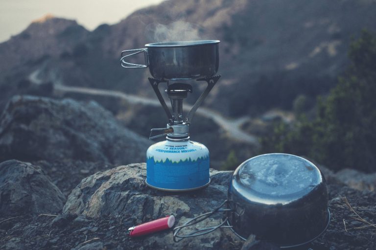 Bikepacking camp stove overlooking cliff