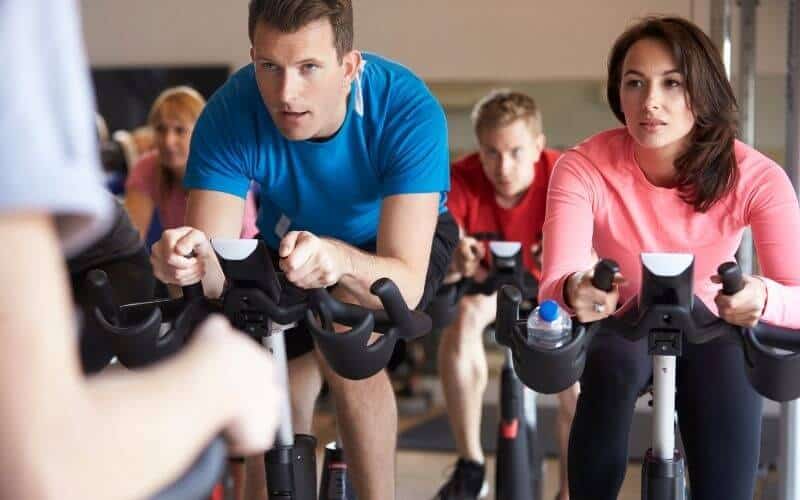 Woman and Man in a spinning class