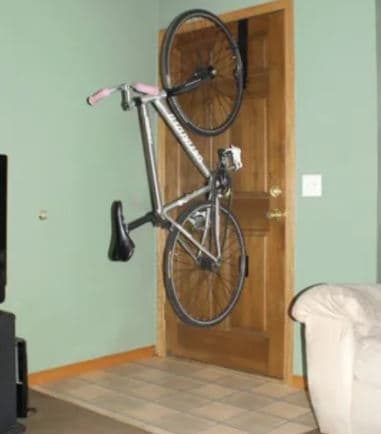 Bike loaded into a door mount system