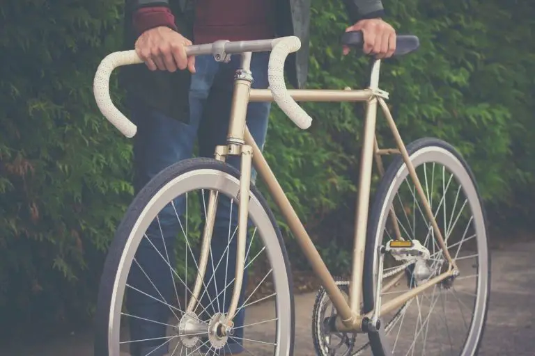 Man Pushing His Fixie Bike
