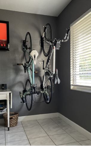 Wall mounted hooks with 2 road bikes