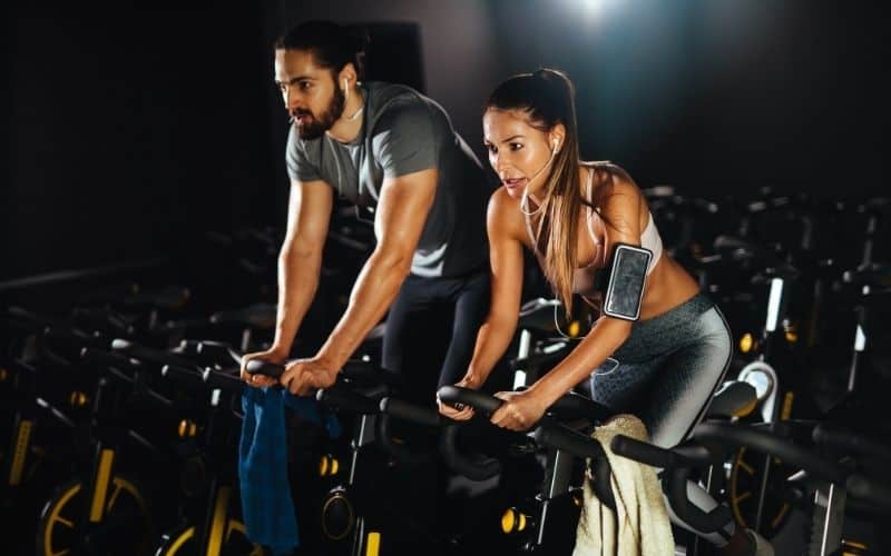 Spinning class with woman and man