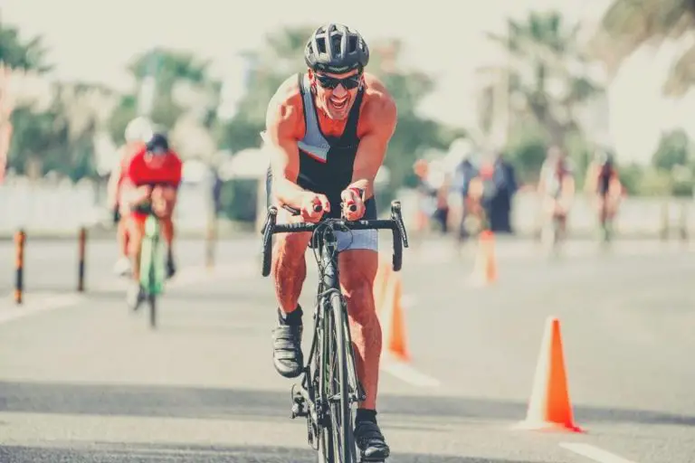 Man riding during triathlon race