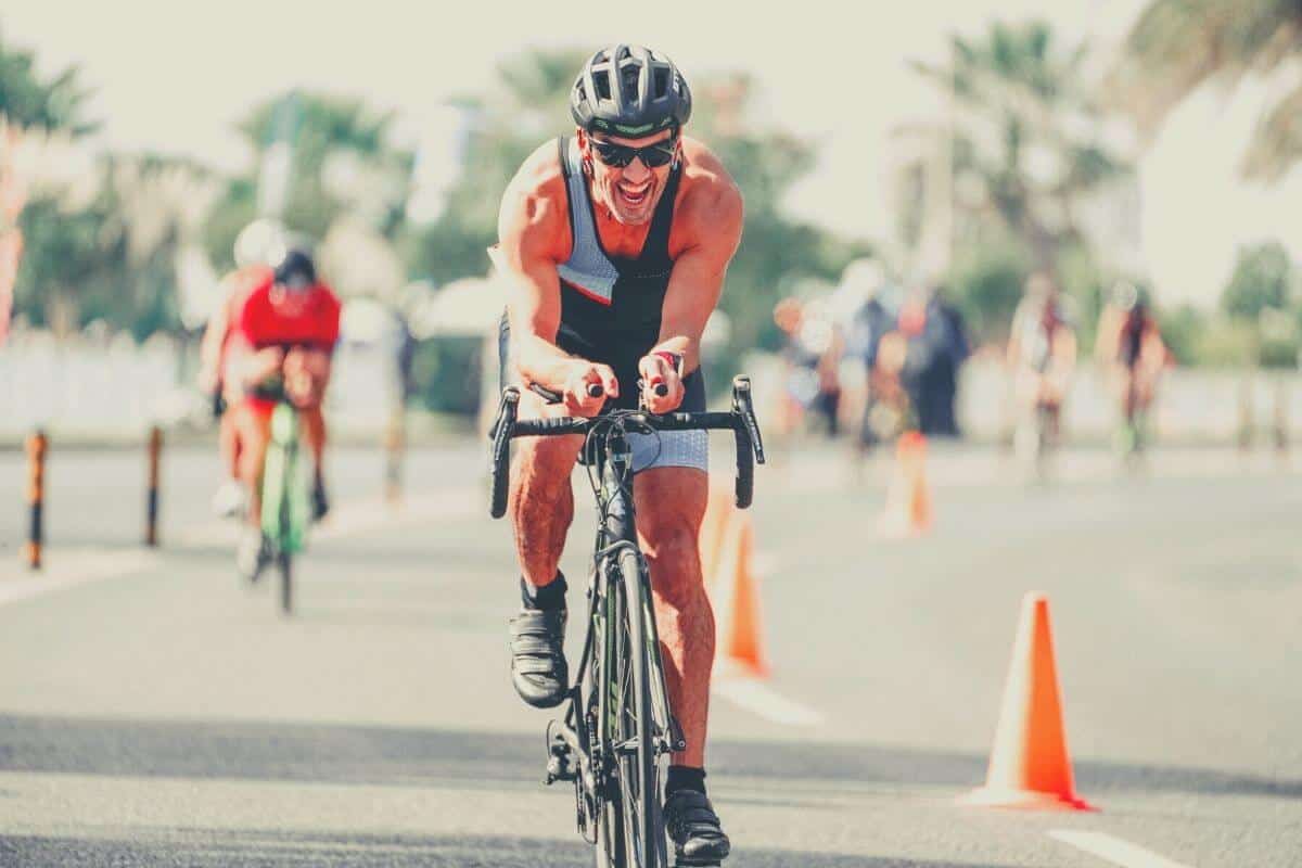 Man riding during triathlon race