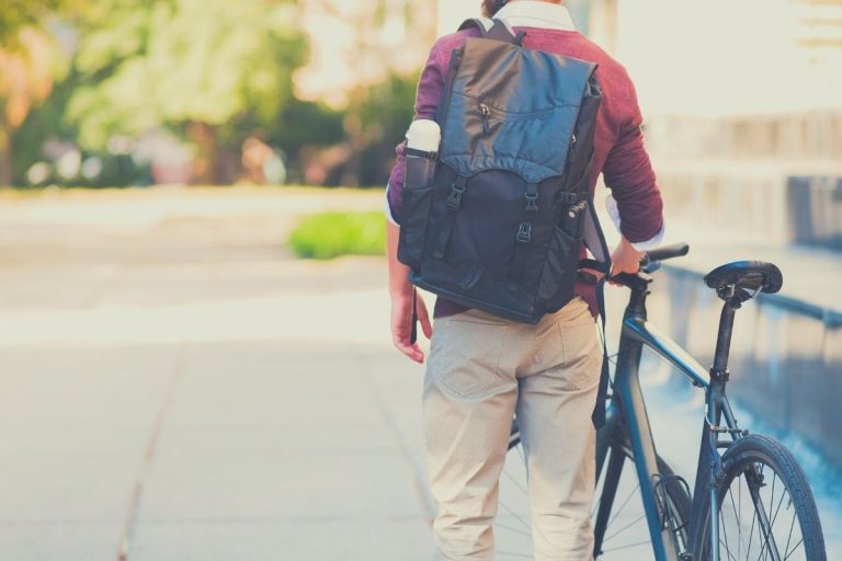 Male commuter riding his bike to work