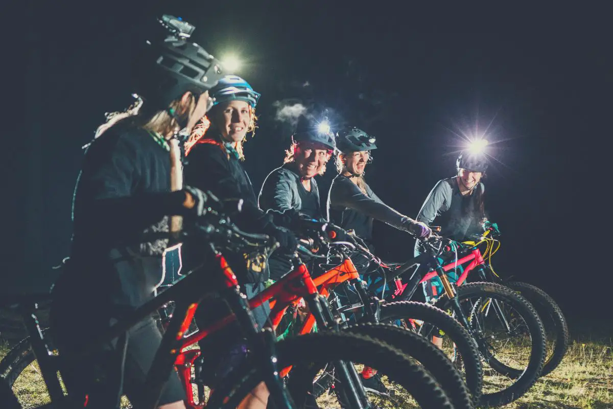 Womens mountain biking club on night ride