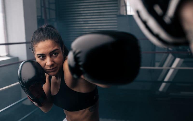 Woman throwing a punch