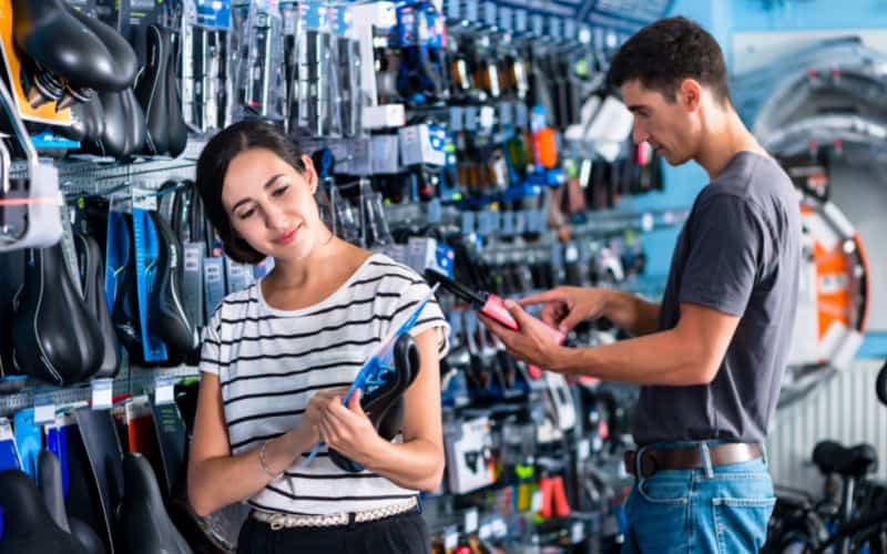 Woman buying a new bike seat