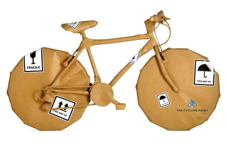 Brown paper wrapped bike for travel