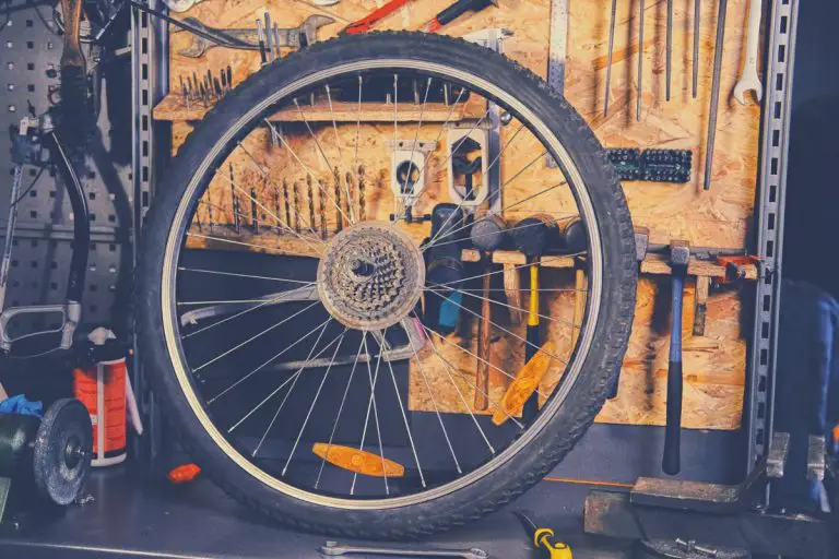 Single bike wheel in workshop