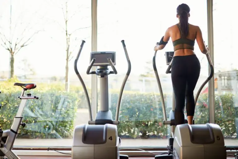 Woman on elliptical machine